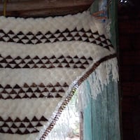 Artesanas tejen tradición: el ovecha rague sigue vigente